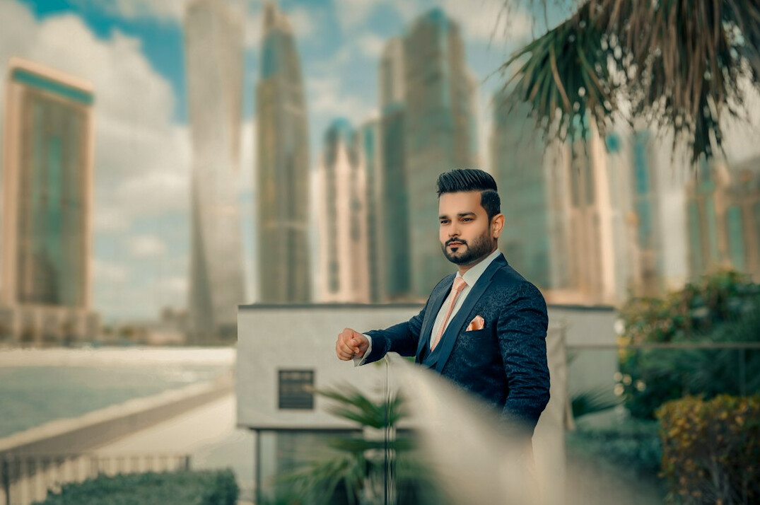 Portrait of a European male television news anchor in a suit