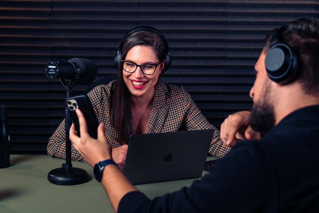talk show host interviewing guest